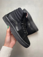 Vans altas negras