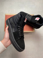 Vans altas negras